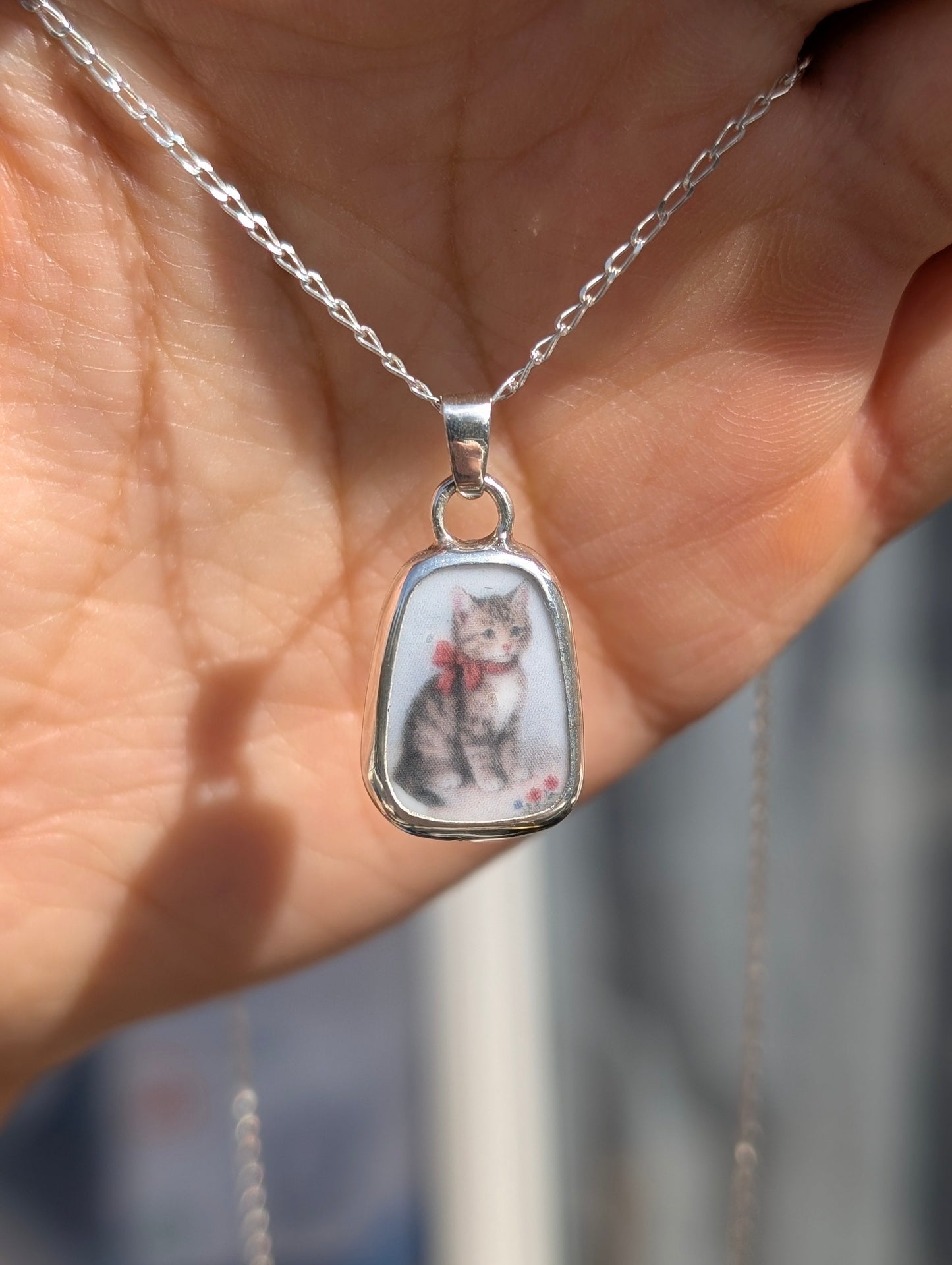 Collier chat noeud rouge