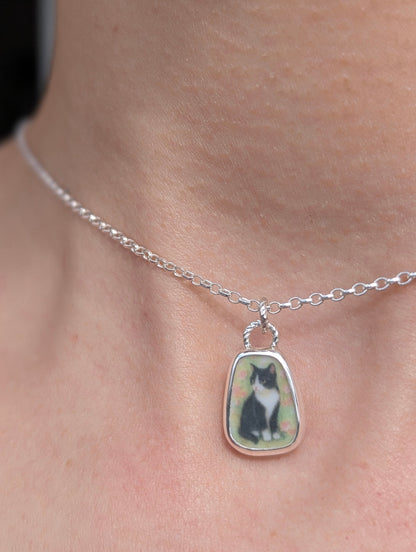 Collier chat noir et blanc